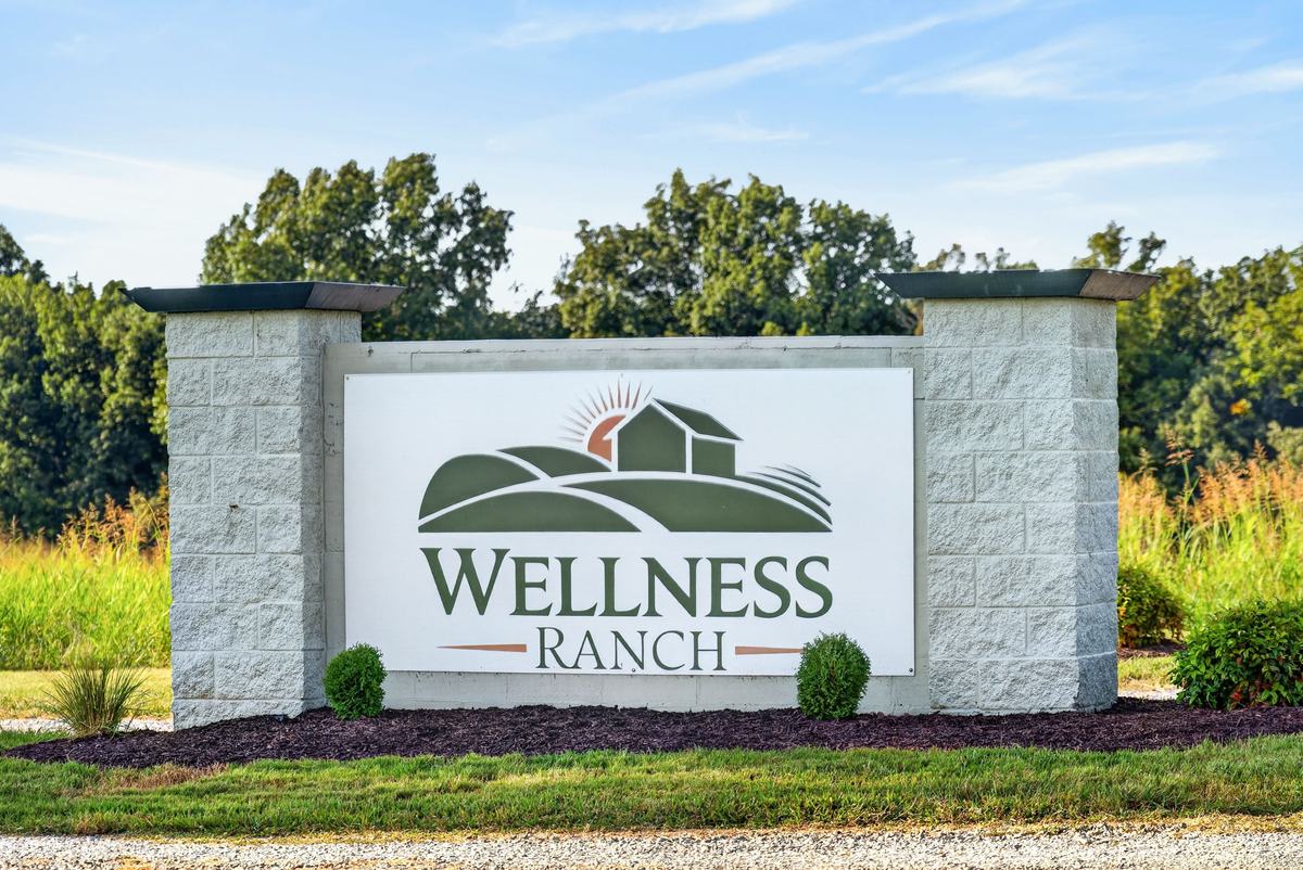 The Wellness Ranch monument sign at the entrance to the property